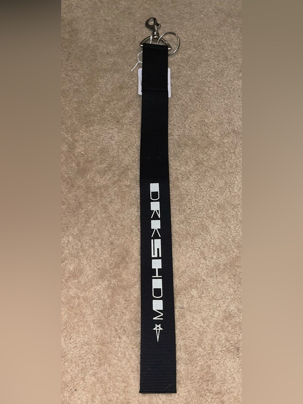 Rick Owens. Black Webbing keychain with White Logo
